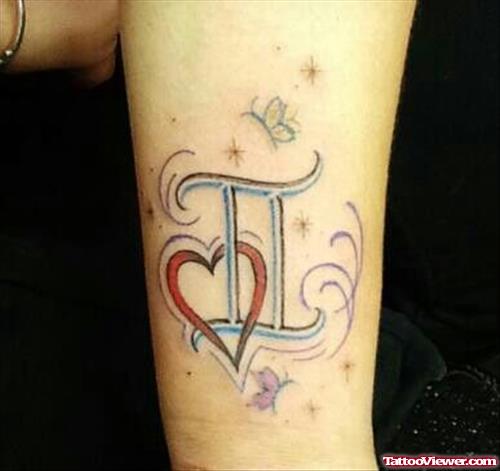 Red Heart And Gemini Zodiac Tattoo On Arm
