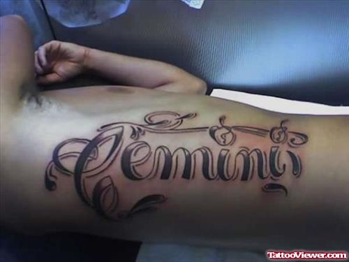Grey Ink Gemini Tattoo On Rib Side