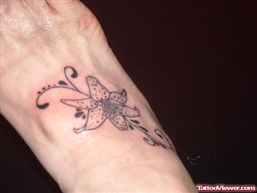 Grey Ink Flower And Gemini Tattoo