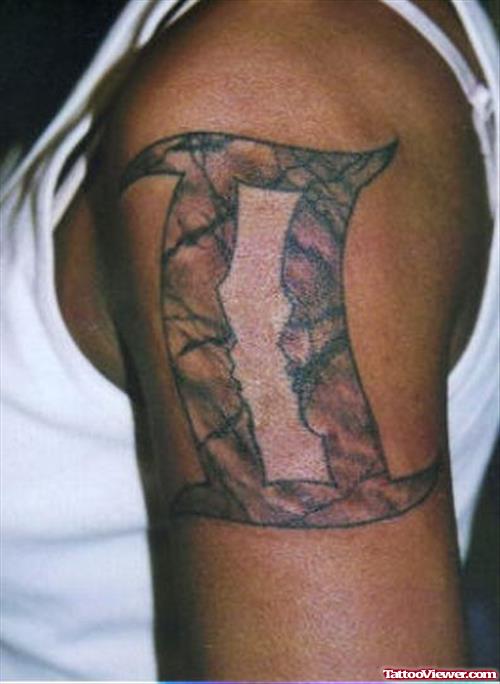Latest Grey Ink Gemini Tattoo On Left Shoulder