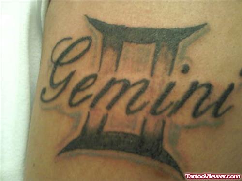 Beautiful Grey Ink Gemini Tattoo On Bicep
