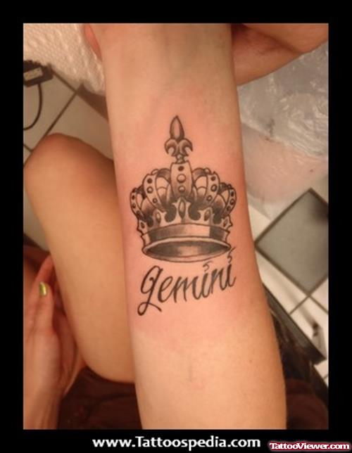 Grey Ink Crown Gemini Tattoo On Bicep