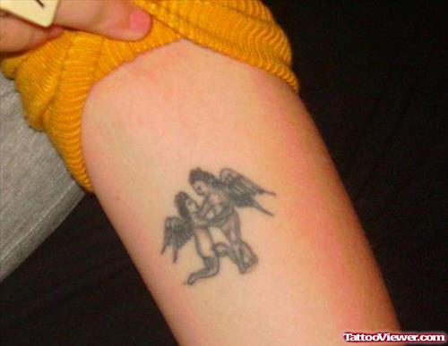 Girl Showing Her Gemini Tattoo