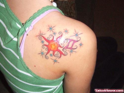Tribal Sun and Gemini Tattoo on Back Shoulder
