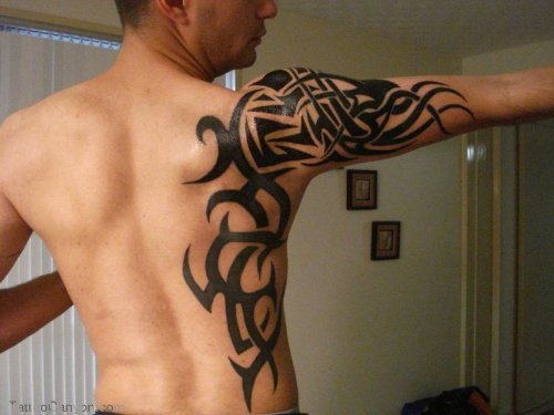 Black Ink Tribal Gemini Tattoo On Side