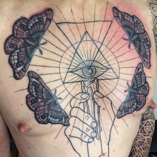 Grey Ink Moth and Geometric Tattoos On Man Chest