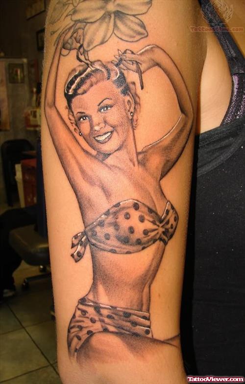 Pin Up Girl Tattoo On Upper Arm