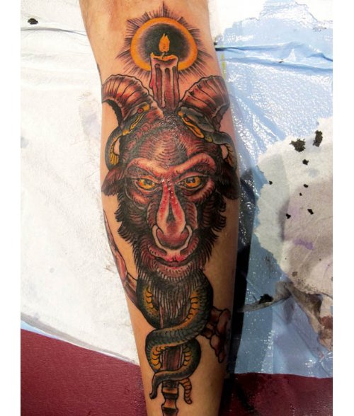Goat Head With Snakes And Burning Candle Tattoo