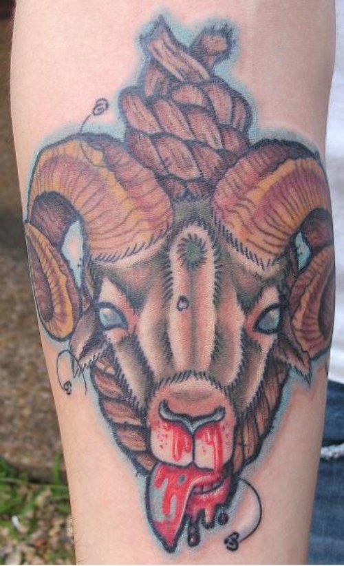 Goat Head Biceps Tattoo