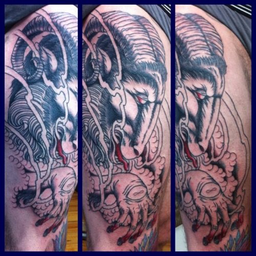 Grey Ink Goat Head Tattoo On Thigh