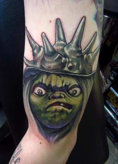 Scary Goblin Tattoo On Bicep