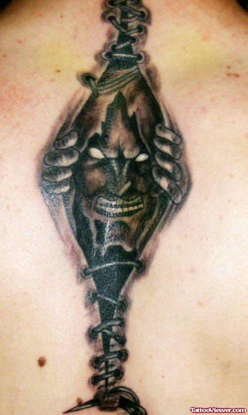 Ripped Skin Gothic Tattoo On BAck Body