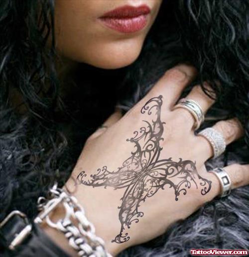 Grey Ink Gothic Tattoo On Girl Right Hand