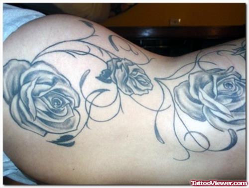 Grey Ink Gothic Rose Flowers Tattoo On Side