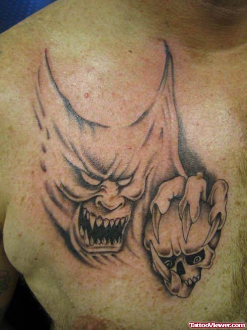 Grey Ink Gothic Tattoo On Man Chest