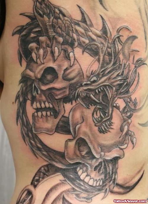 Grey Ink Gothic Skulls Tattoos On Side Rib