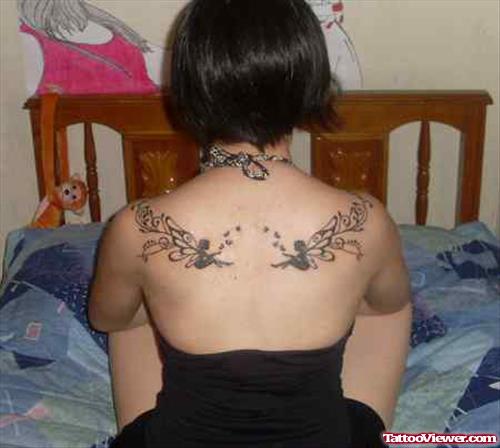 Gothic Tattoo On Girl Upperback