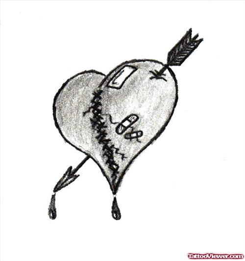 Grey Ink Arrow In Gothic Heart Tattoo Design