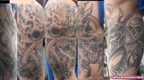 Amazing Grey Ink Gothic Tattoo On Half Sleeve