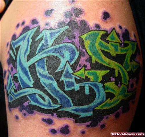 Colored Ink Graffiti Tattoo On Shoulder