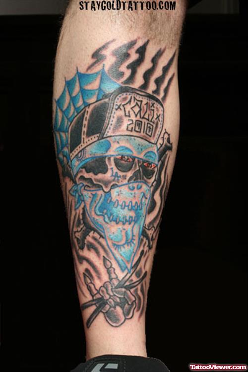 Blue Ink Skull Graffiti Tattoo On Sleeve