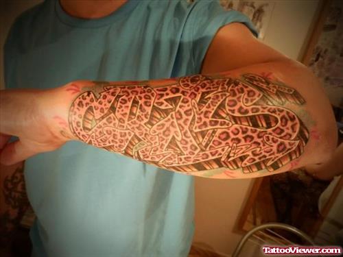 Graffiti Tattoo On Left Arm