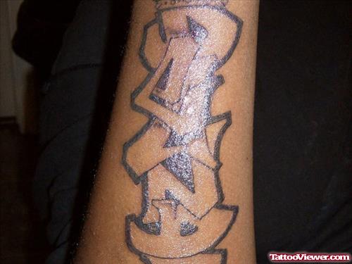 Grey Ink Graffiti Arm Tattoo