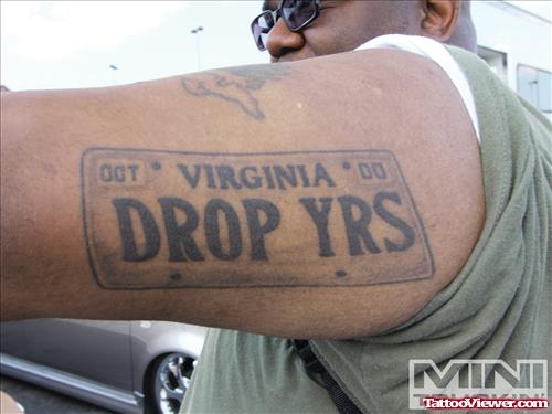 Drop YRS Graffiti Tattoo On Left Bicep
