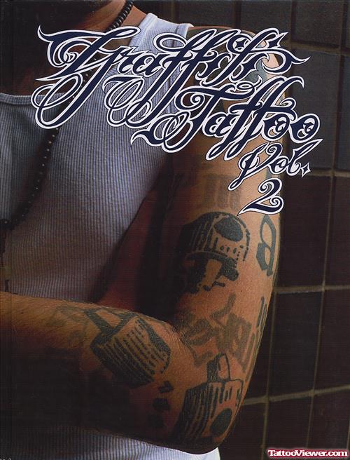 Grey Ink Graffiti Tattoo On Left Sleeve