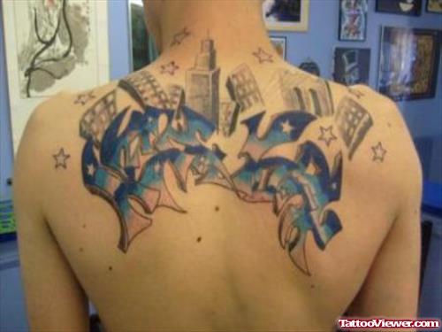 Blue Ink Graffiti Tattoo On Upperback