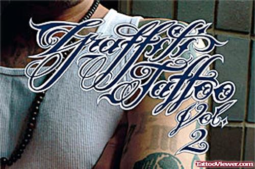 Man With Graffiti Tattoo On Left Half Sleeve