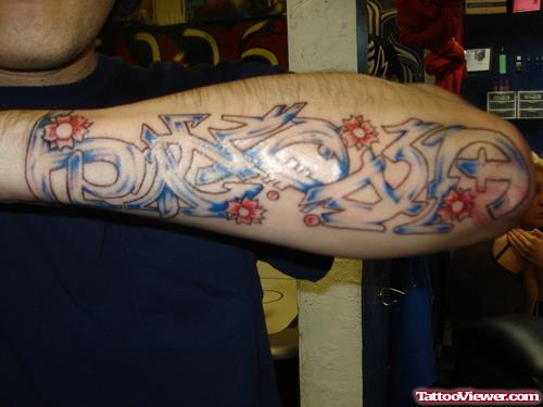 Graffiti Tattoo On Man Left Sleeve