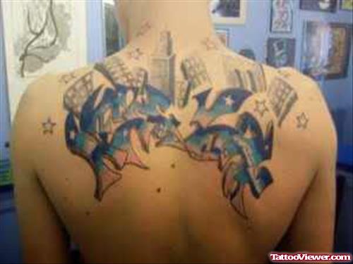 Dark Ink Graffiti Tattoo On Man Upperback