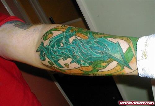 Green Ink Graffiti Tattoo On Sleeve