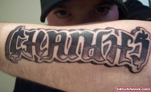 Grey Ink Graffiti Tattoo On Left Arm For Men