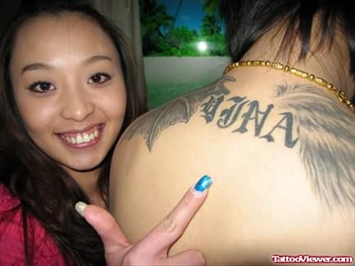 China Graffiti Tattoo On Upper Back