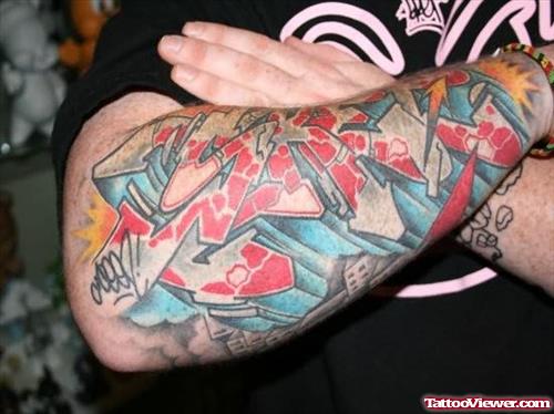 Nice Graffiti Tattoo On Arm