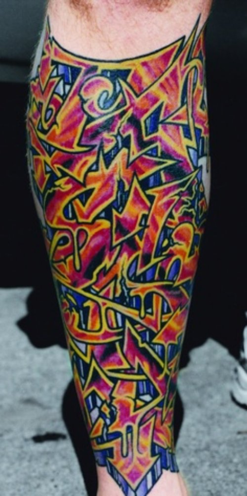 Awesome Colored Graffiti Tattoo On Sleeve