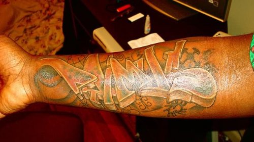 Arm Graffiti Letters Tattoo