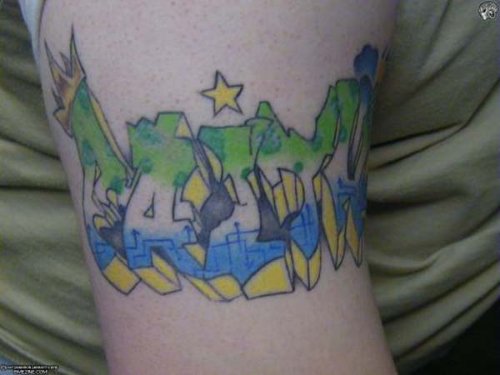 Colored Graffiti Tattoo On Man Right Bicep