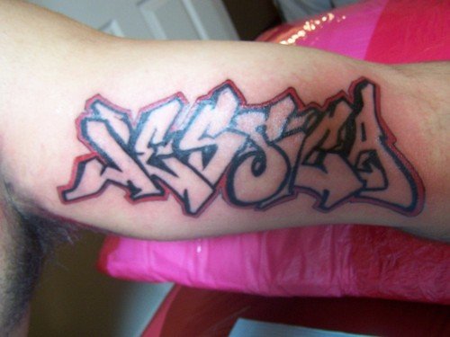 Amazing Grey Ink Graffiti Tattoo On Sleeve