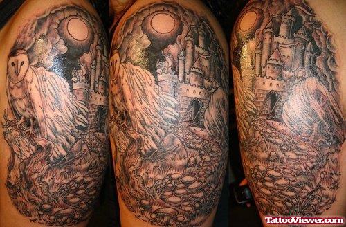 Grey Ink Graveyard Tattoo On Man Left Shoulder
