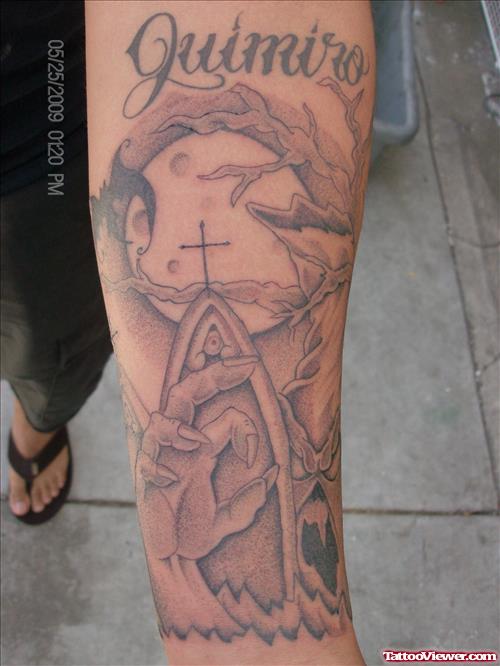 Grey Ink Graveyard Cross Tattoo On Left Forearm