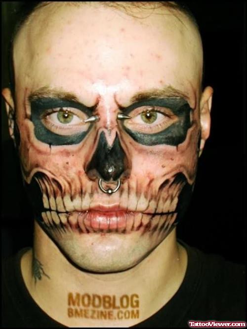 Skull Design Tattoo On Face