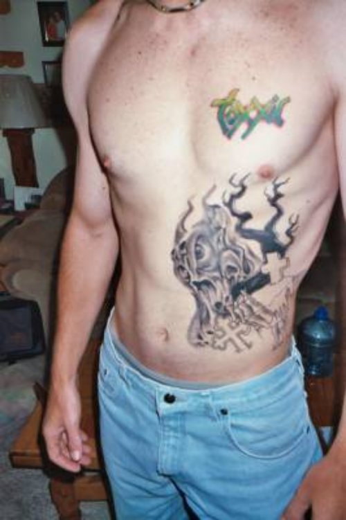 Man Rib Side Graveyard Tattoo