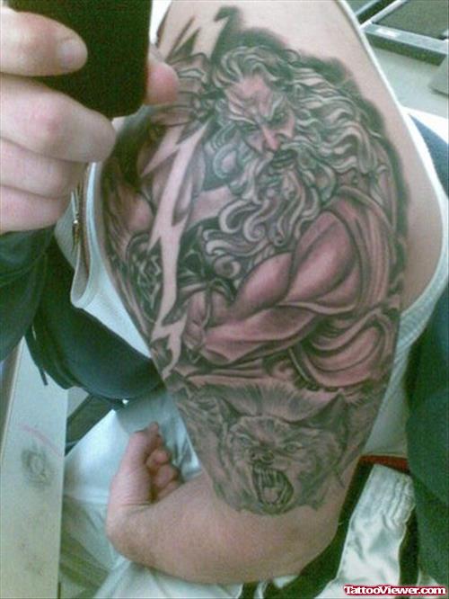 Greek Tattoo On Man Left Half Sleeve