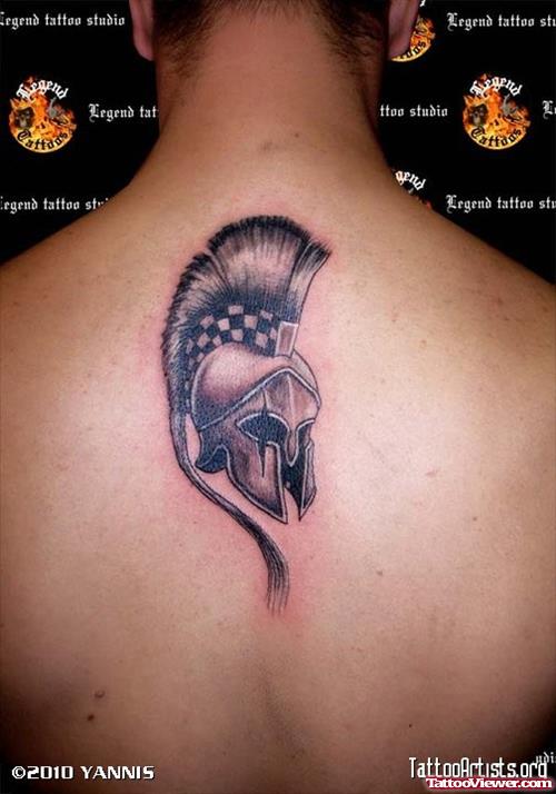 Grey Ink Greek Tattoo On Man Upperback