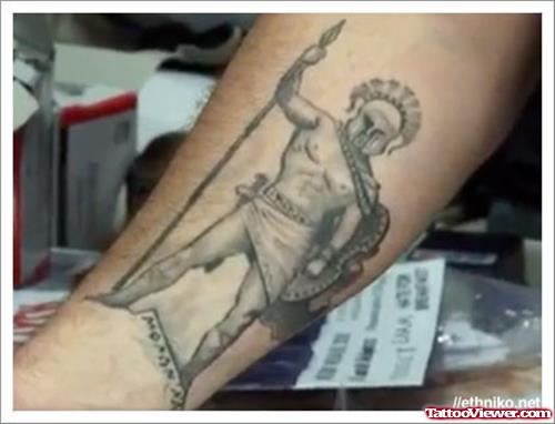Grey Ink Greek Tattoo On Arm