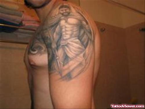 Amazing Grey Ink Greek Tattoo On Man Left Shoulder