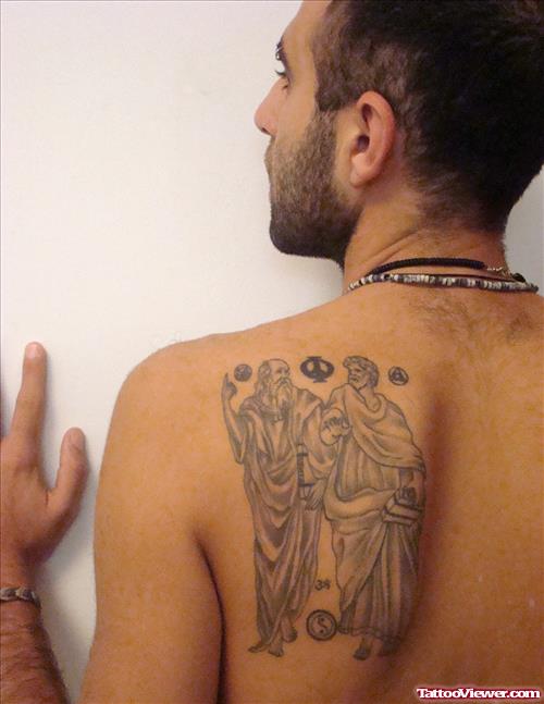Grey Ink Greek Tattoo On Left Back Shoulder